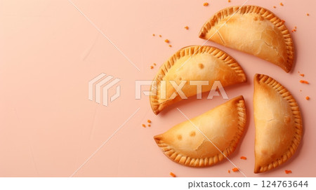 Flat lay empanadas meat meal stuffed pastel baked salty appetizer 124763644