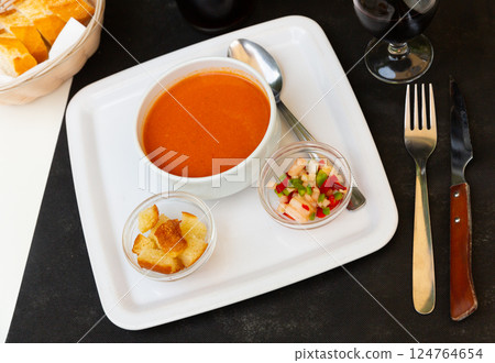 Andalusian vegetable soup puree gazpacho with croutons and vegetables 124764654
