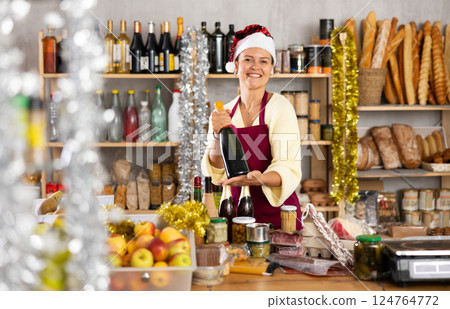 Woman seller in Santa Claus hat with food 124764772