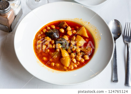 Portion of chickpea soup in restaurant Portion of chickpea soup in restaurant 124765124