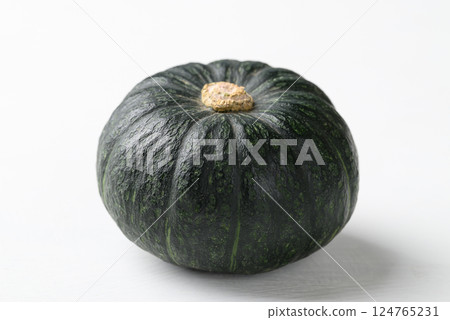 Green pumpkin on white background, Japanese pumpkin or Kabocha squash 124765231