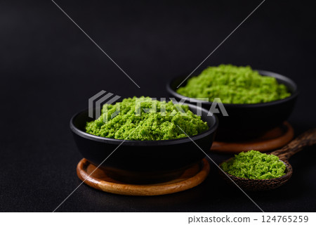Wolffia or watermeal on black background, Healthy edible small aquatic plant high protein and fiber 124765259
