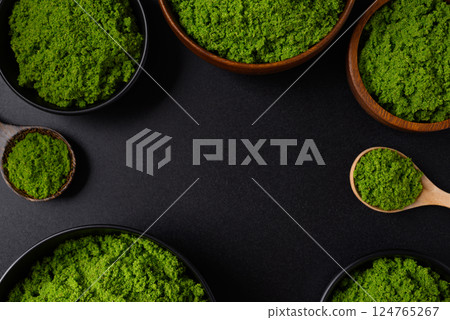 Wolffia or watermeal on black background, Healthy edible small aquatic plant high protein and fiber 124765267