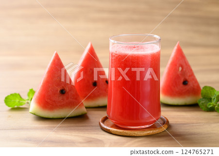 Fresh watermelon juice in glass on wooden background, Summer drink 124765271