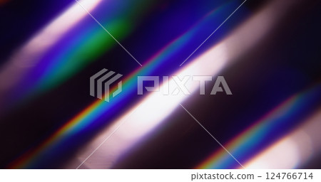 Flicker shine. Blur laser. Defocused blue purple green multicolor rainbow flare spectrum light on abstract art dark black background. 124766714