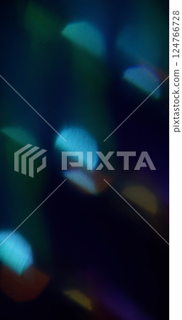 Flare glare. Blur spark texture. Defocused yellow blue purple multicolor magical light on abstract art dark black background. Flare glare. Blur spark texture. Defocused yellow blue purple multicolor magical light on abstract art dark black background. 124766728