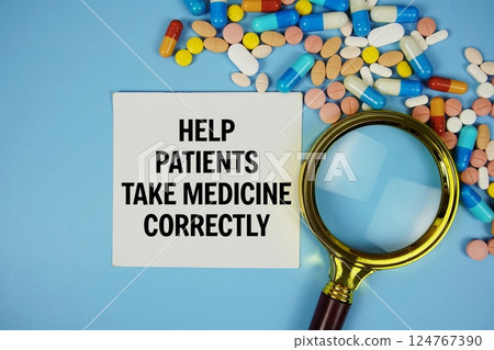 Help Patients Take Medicine Correctly text on sticky note paper with Medicine and Magnifying glass on blue background Help Patients Take Medicine Correctly text on sticky note paper with Medicine and Magnifying glass on blue background 124767390