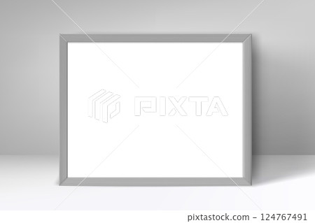 Grey portrait frame on white wall. 3d vector mockup Grey portrait frame on white wall. 3d vector mockup 124767491