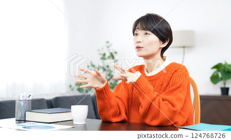 Middle-aged women in casual wear having a conversation Middle-aged women in casual wear having a conversation 124768726