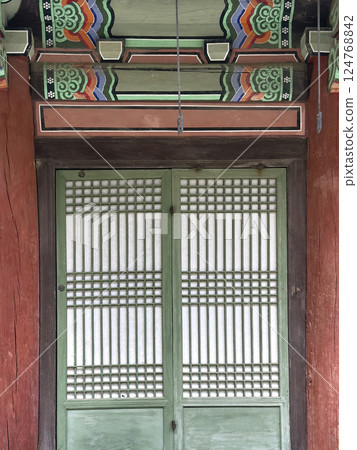 The quiet shadows and natural textures of hanok invite you into a space of peace and nostalgia. The quiet shadows and natural textures of hanok invite you into a space of peace and nostalgia. 124768842