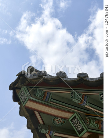 The quiet shadows and natural textures of hanok invite you into a space of peace and nostalgia. 124768843