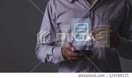 Young man with smartphone mobile hand using a pen touching to sign a Online Business Contract Young man with smartphone mobile hand using a pen touching to sign a Online Business Contract 124769171