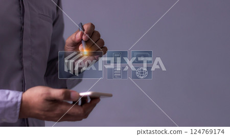 Man using smartphone to Tax online internet network, Tax Time, Offers online tax refund 124769174