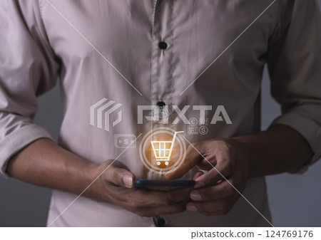 Young Man Using Smartphone For Online shoppinge pent, Online payment Young Man Using Smartphone For Online shoppinge pent, Online payment 124769176