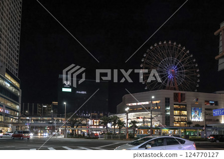 March 22 2025 Cityscape Featuring Ferris Wheel and Brightly Lit Urban, Japan March 22 2025 Cityscape Featuring Ferris Wheel and Brightly Lit Urban, Japan 124770127