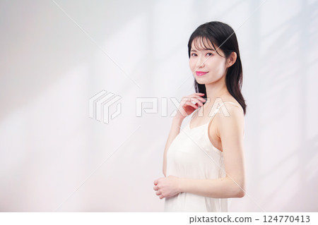 Beauty image of a young woman (simple background) Beauty image of a young woman (simple background) 124770413