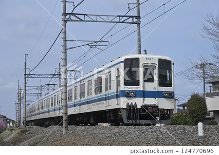 Tobu Noda Line: 8000 series train running on a single track section Tobu Noda Line: 8000 series train running on a single track section 124770696