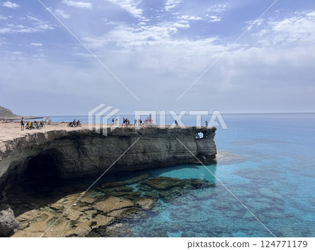 Sea Caves in Cape Greco National Forest Park, Ayia Napa, Cyprus in the Mediterranean Sea Sea Caves in Cape Greco National Forest Park, Ayia Napa, Cyprus in the Mediterranean Sea 124771179