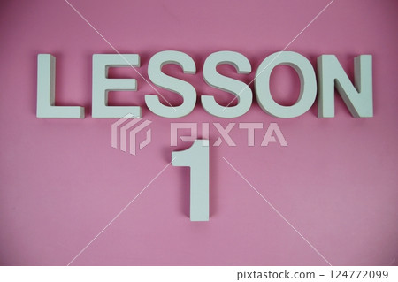 Lesson 1 Lesson One alphabet letters on pink background 124772099