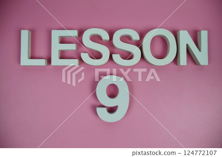 Lesson 9, Lesson Nine alphabet letters on pink background 124772107