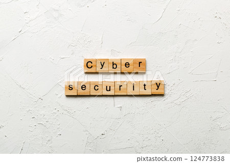 Cyber Security word written on wood block. Cyber Security text on cement table for your desing, concept 124773838