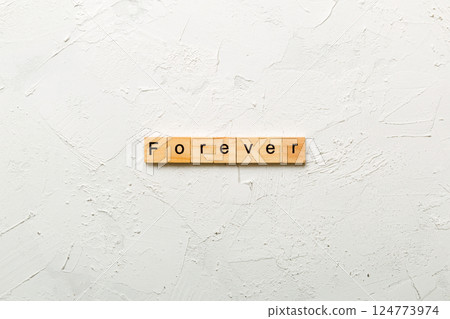 forever word written on wood block. forever text on table, concept 124773974