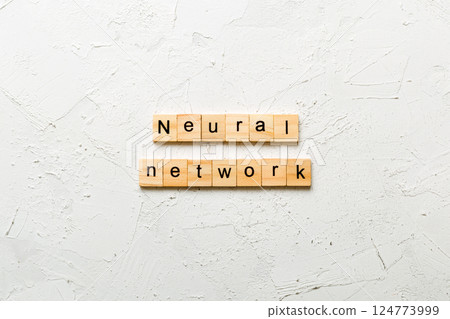 NEURAL NETWORK word written on wood block. NEURAL NETWORK text on cement table for your desing, concept 124773999