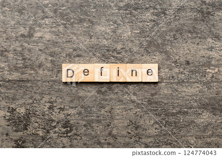 Define word written on wood block. Define text on cement table for your desing, concept Define word written on wood block. Define text on cement table for your desing, concept 124774043