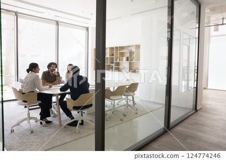 Multiethnic employees, shareholders negotiate behind closed doors 124774246