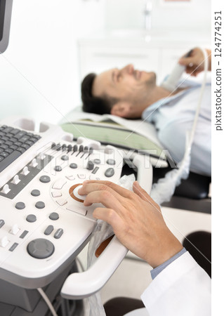 Patient pass thyroid gland check-up, close up Patient pass thyroid gland check-up, close up 124774251