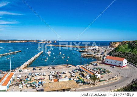 View of fisher boats moored in the Port of Sagres, Algarve in Portugal. View of fisher boats moored in the Port of Sagres, Algarve in Portugal. 124774899