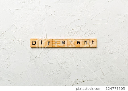 different word written on wood block. different text on table, concept. different word written on wood block. different text on table, concept. 124775305