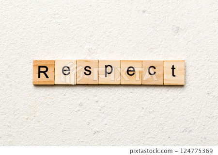 respect word written on wood block. respect text on table, concept respect word written on wood block. respect text on table, concept 124775369