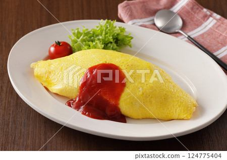 Delicious omelet rice with ketchup 124775404