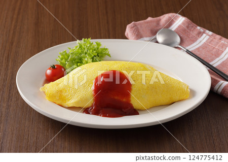 Delicious omelet rice with ketchup Delicious omelet rice with ketchup 124775412