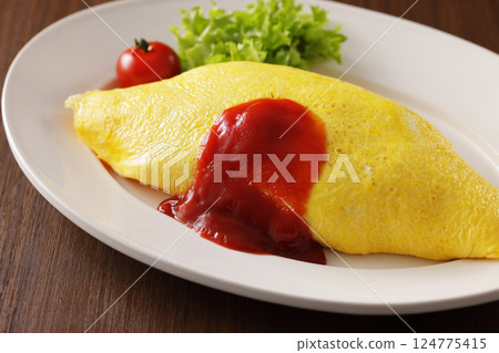 Delicious omelet rice with ketchup Delicious omelet rice with ketchup 124775415