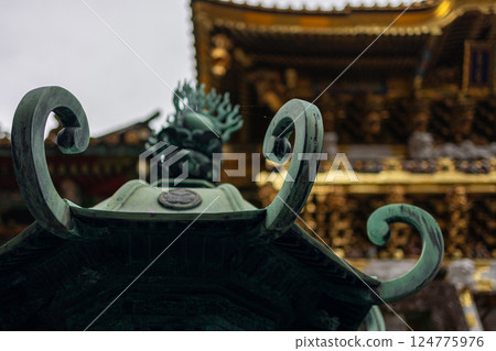 Close-up of an ornate bronze lantern at Toshogu Shrine in Nikko Japan Close-up of an ornate bronze lantern at Toshogu Shrine in Nikko Japan 124775976