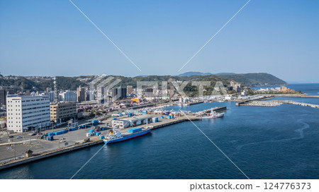 March 23 2025 Waterfront Scene Showcasing Ferry, Terminal, and Cityscape, Japan 124776373