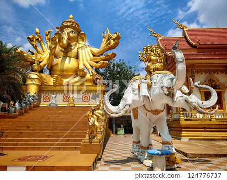 Gold ganecha with thousand hands and elephant statues, Sa Kaeo 124776737
