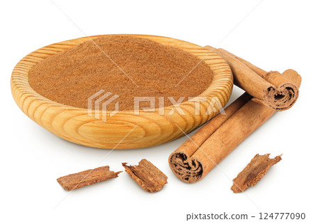 Cinnamon sticks with powder in wooden bowl isolated on white background with full depth of field Cinnamon sticks with powder in wooden bowl isolated on white background with full depth of field 124777090