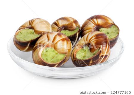 escargot snail filled with garlic and parsley butter in glass bowl isolated on white background escargot snail filled with garlic and parsley butter in glass bowl isolated on white background 124777160