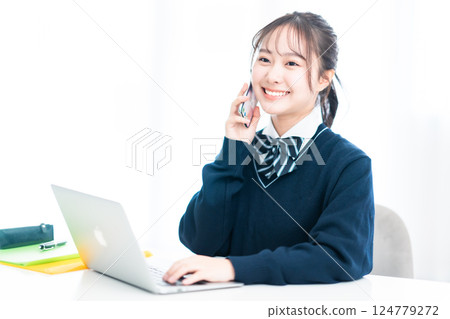 High school student talking on smartphone High school student talking on smartphone 124779272