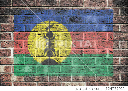 New Caledonia flag on a brick wall background New Caledonia flag on a brick wall background 124779921