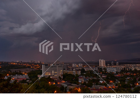 Powerful lightning bolt strikes during storm Powerful lightning bolt strikes during storm 124780112