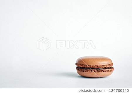 one brown macaron stack on gray background one brown macaron stack on gray background 124780340