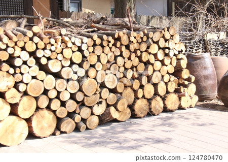 pile of wood logs 124780470