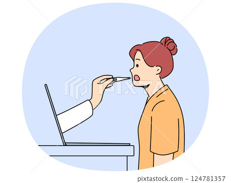 Woman patient uses telemedicine services standing near laptop with doctor hand sticking out screen 124781357