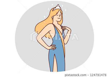 Cheerful woman in evening dress with crown on hair participating in beauty contest or fashion show 124781478