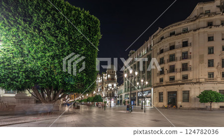 Illuminated Adriatica building on Avenida de la Constitucion at night, Seville, Spain Illuminated Adriatica building on Avenida de la Constitucion at night, Seville, Spain 124782036