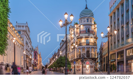 Illuminated Adriatica building on Avenida de la Constitucion at night, Seville, Spain 124782037
